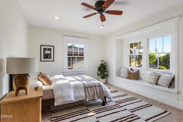a bathroom with a tub and shower