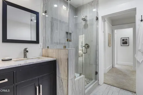 a bedroom with bed and window