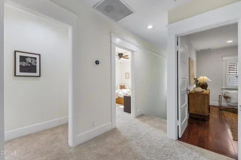a view of a chairs and table in the patio