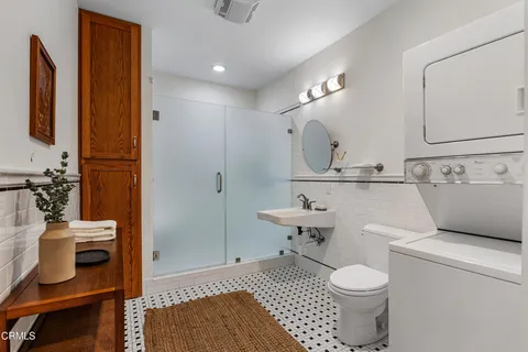 a front view of a house with a yard table and chairs