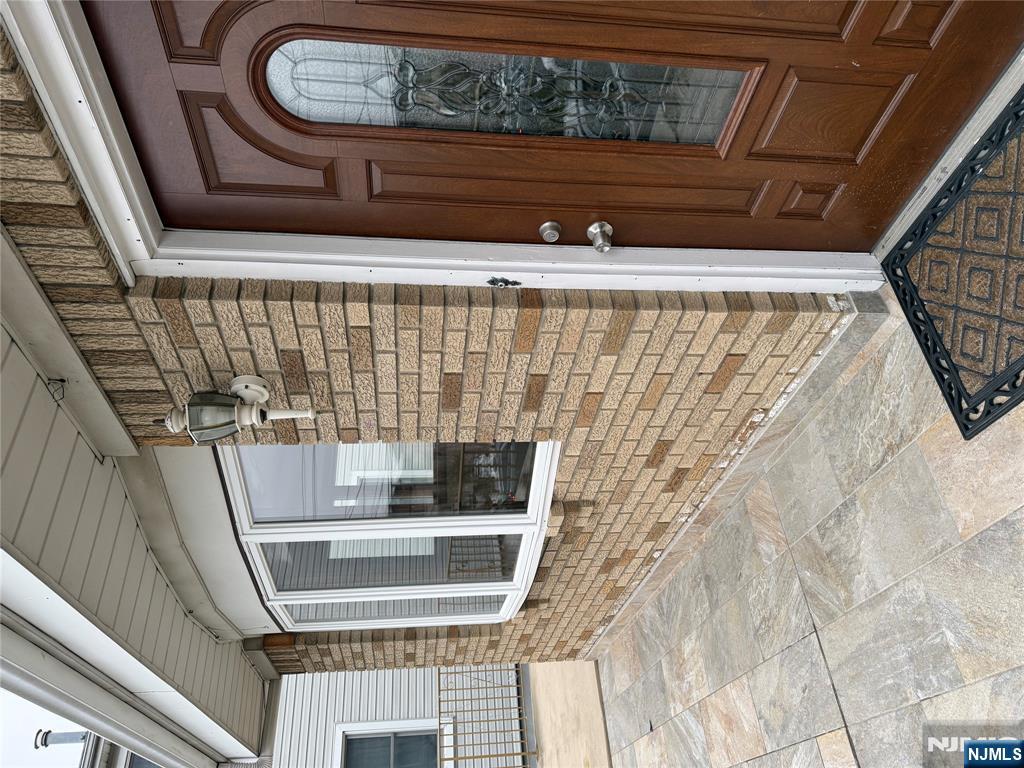 439 Cliff Street, Unit 1 Fairview, NJ 07022 - Photo 15 of 19 a view of front door of a house