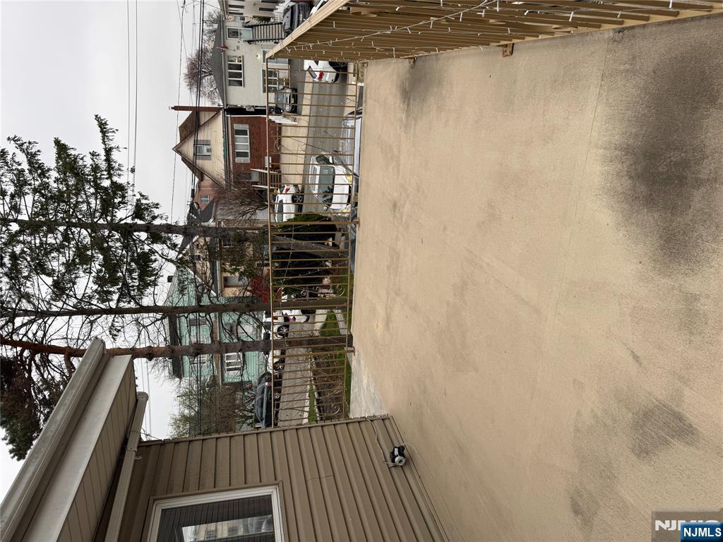 439 Cliff Street, Unit 1 Fairview, NJ 07022 - Photo 17 of 19 a view of residential houses with city view