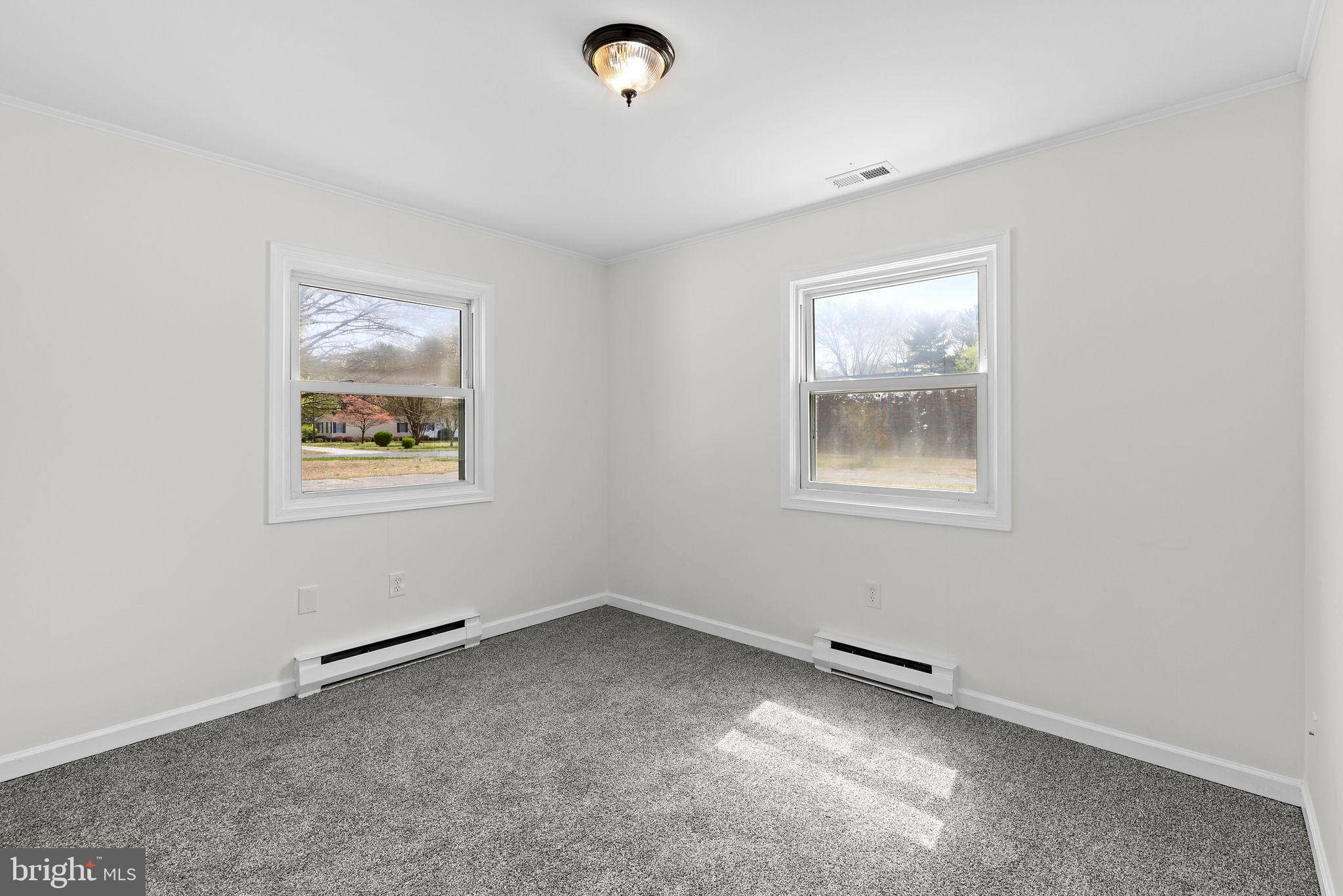 6749 Eldorado Road Federalsburg, MD 21632 - Photo 21 of 39 a view of room with window and ceiling fan