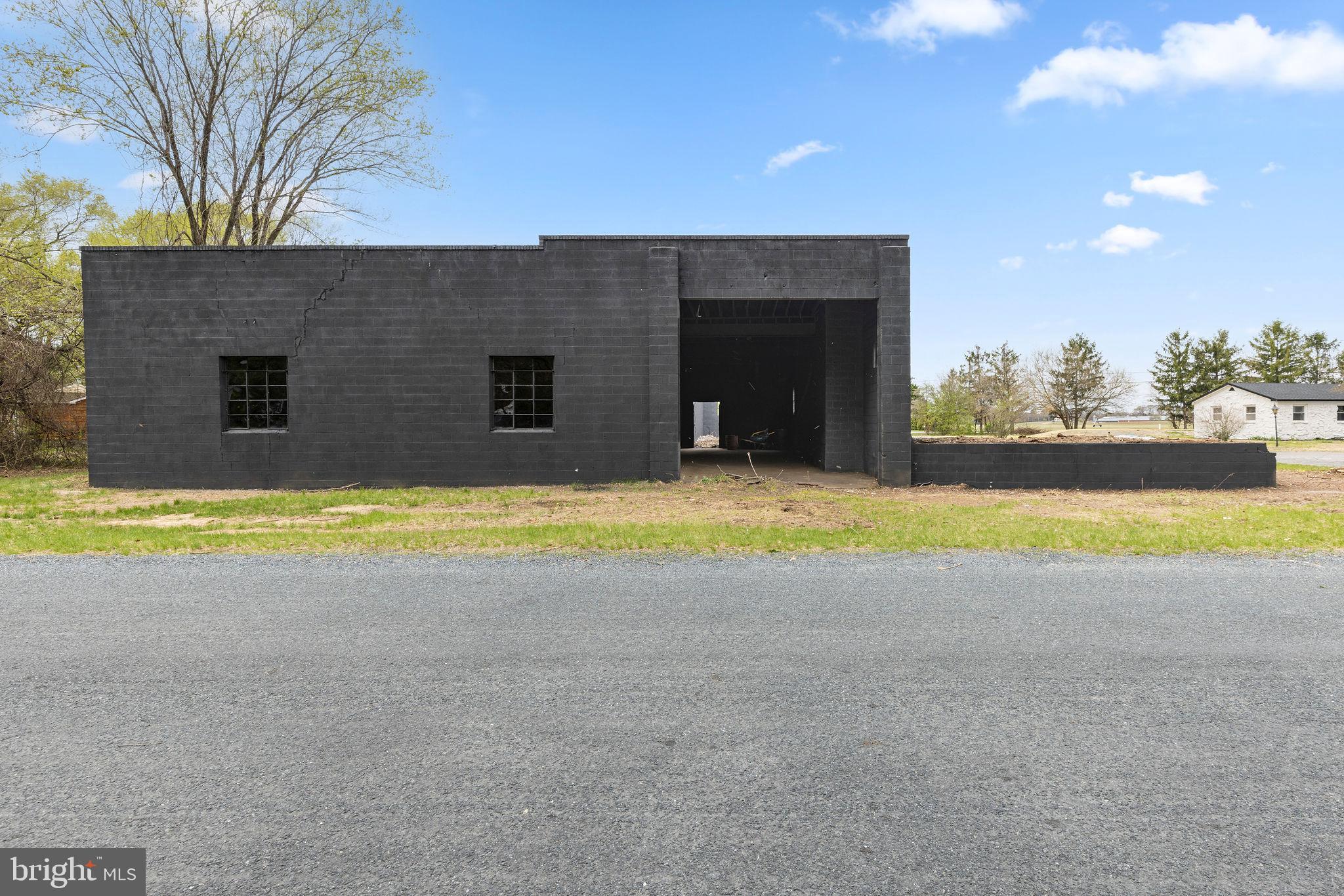 6749 Eldorado Road Federalsburg, MD 21632 - Photo 32 of 39 a view of a house with swimming pool and yard