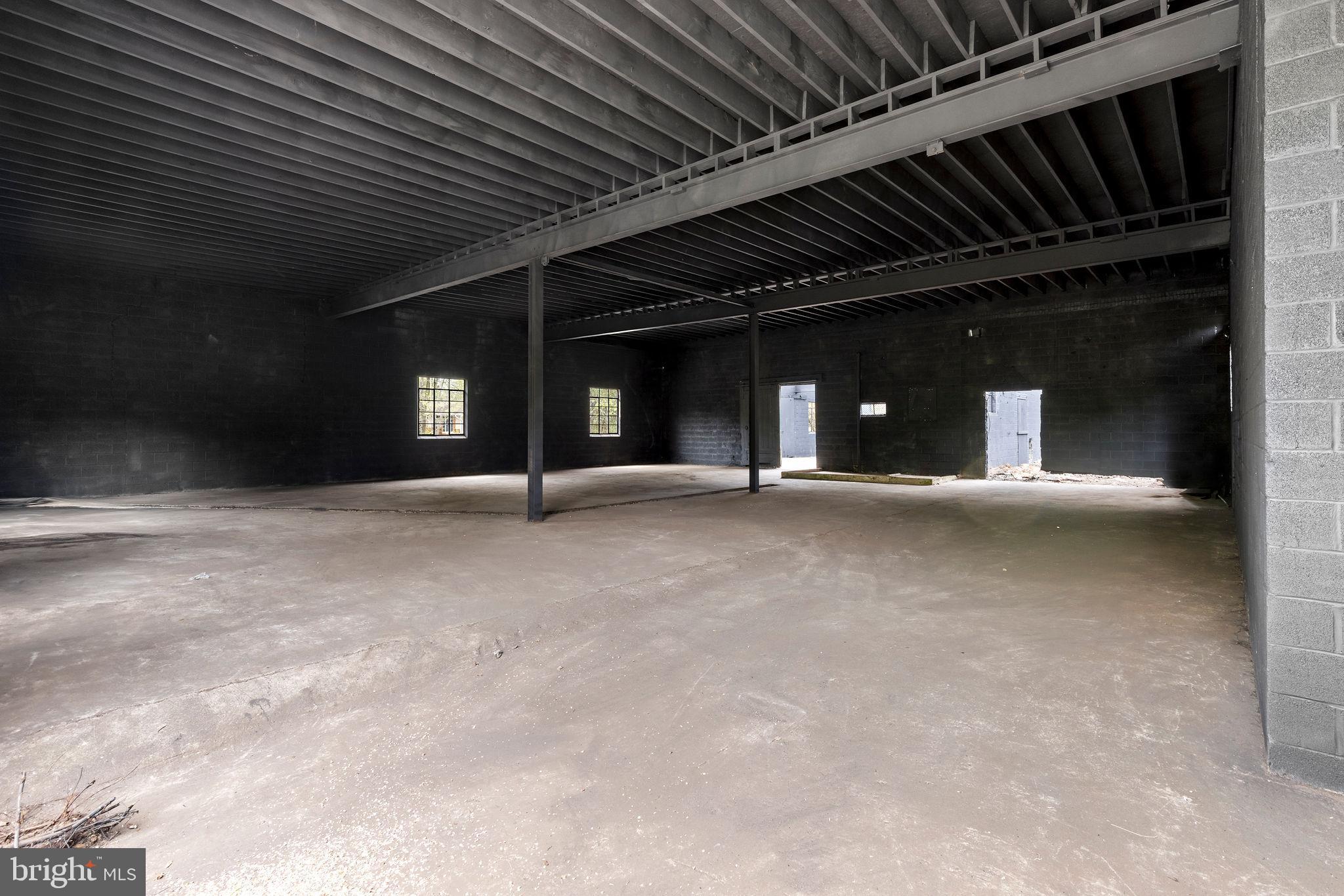 6749 Eldorado Road Federalsburg, MD 21632 - Photo 7 of 39 an empty room with wooden floor