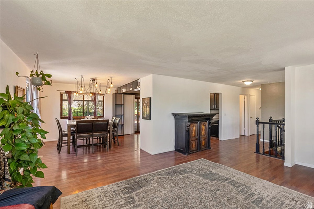 11 South Clark Lane Elk Ridge, UT 84651 - Photo 6 of 46 Living room with dark wood finished floors