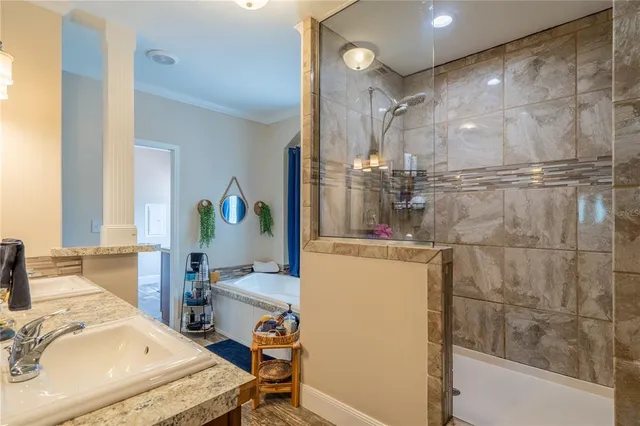 a bathroom with a sink mirror vanity and toilet