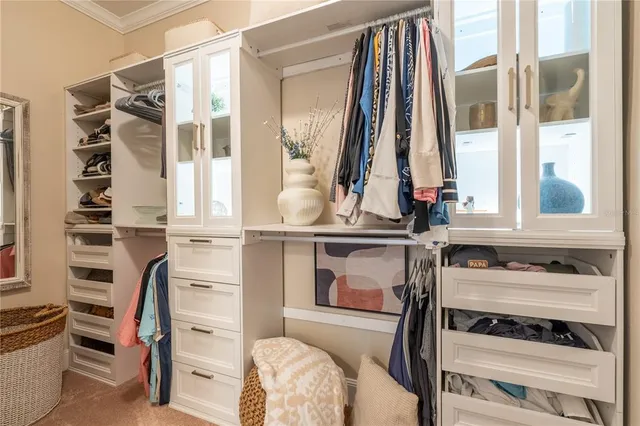 a view of a balcony with furniture and a window