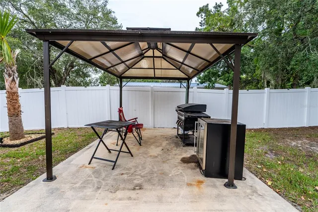 a view of a deck with furniture