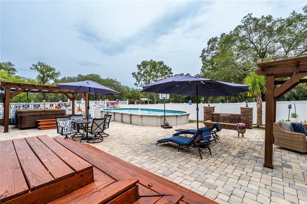 1508 East Winnetka Street Hernando, FL 34442 - Photo 40 of 55 swimming pool view with a seating space