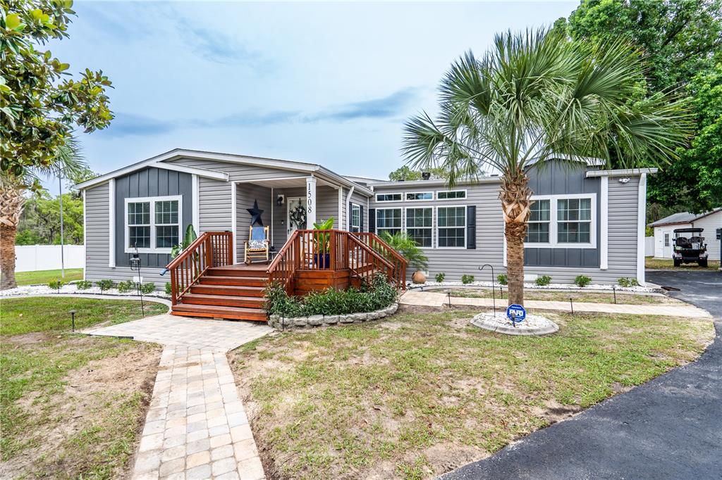 1508 East Winnetka Street Hernando, FL 34442 - Photo 47 of 55 a view of a house with backyard porch and sitting area