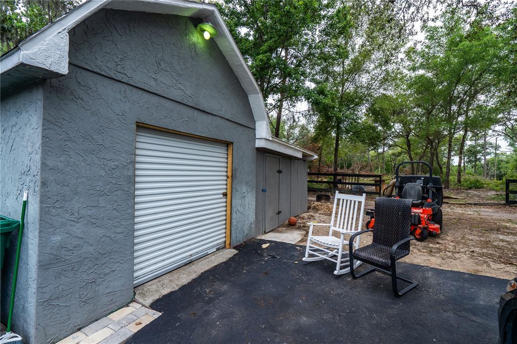 1508 East Winnetka Street Hernando, FL 34442 - Photo 48 of 55 a house view with a sitting space and garden