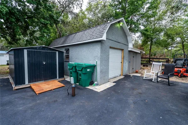 a view of a yard with an outdoor space