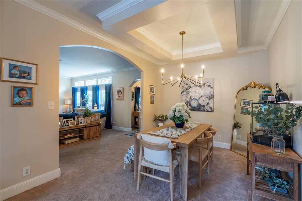 1508 East Winnetka Street Hernando, FL 34442 - Photo 9 of 55 a living room with furniture and a chandelier