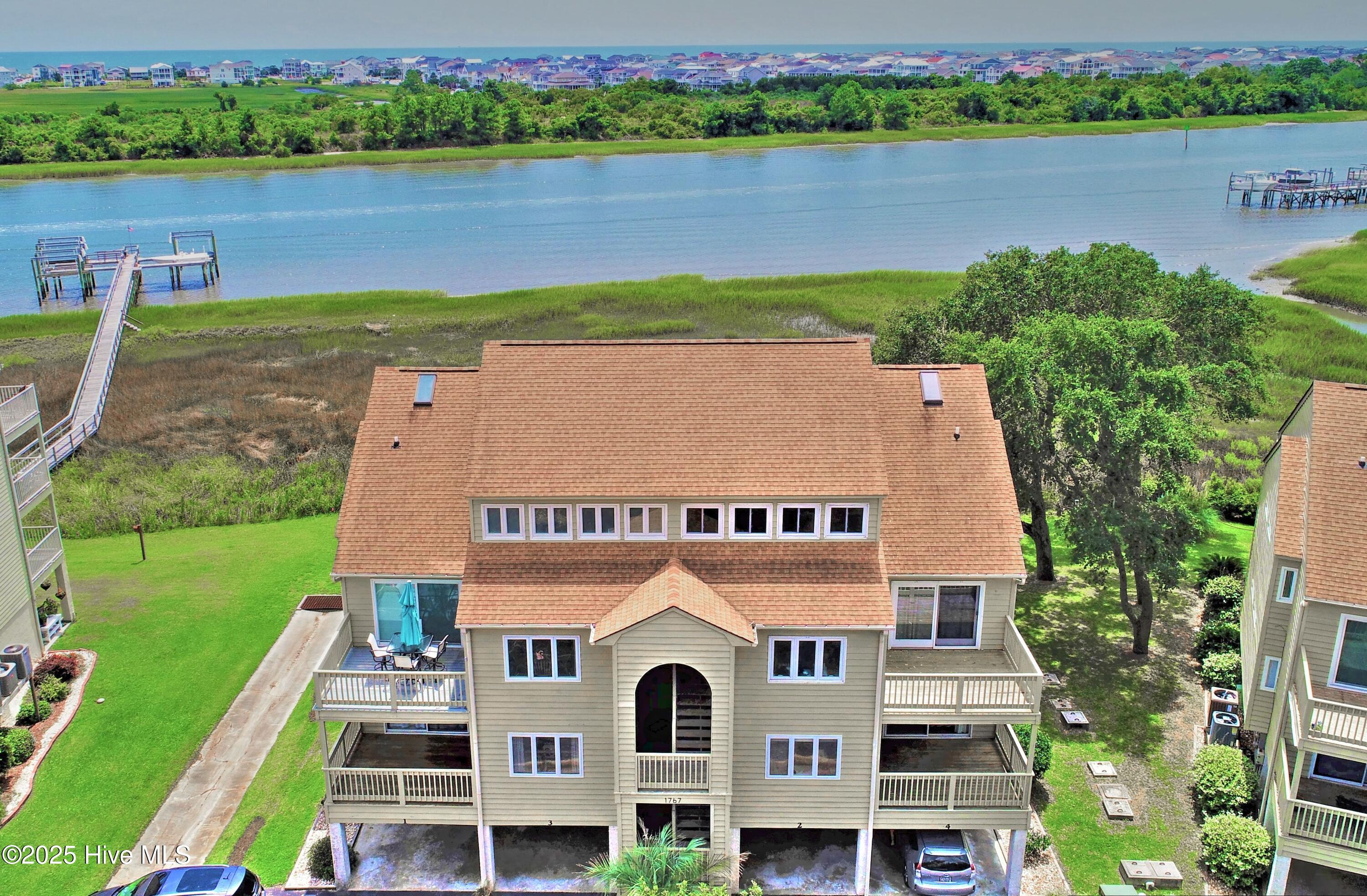 1767 Harborage Drive Southwest, Unit 2 Ocean Isle Beach, NC 28469 - Photo 1 of 39 Drone Front View
