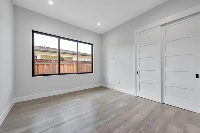 a bathroom with a sink a toilet and a shower