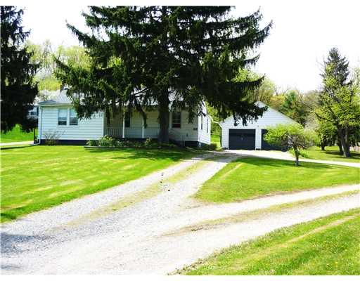 Exterior Front. EXPANSIVE ONE ACRE HOME SITE.