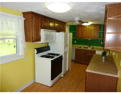 Kitchen. NEW CABINETS AND COUNTER TOPS.  ALL APPLIANCES INCLUDED.