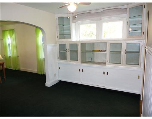 Dining Room. BUILTI-IN CHINA CABINETS AND WAINSCOTING.