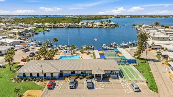 an aerial view of a house with outdoor space
