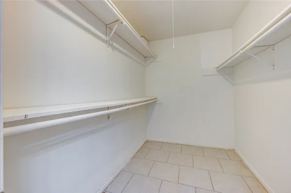 a view of an empty walk in closet
