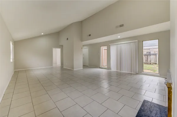 an empty room with windows