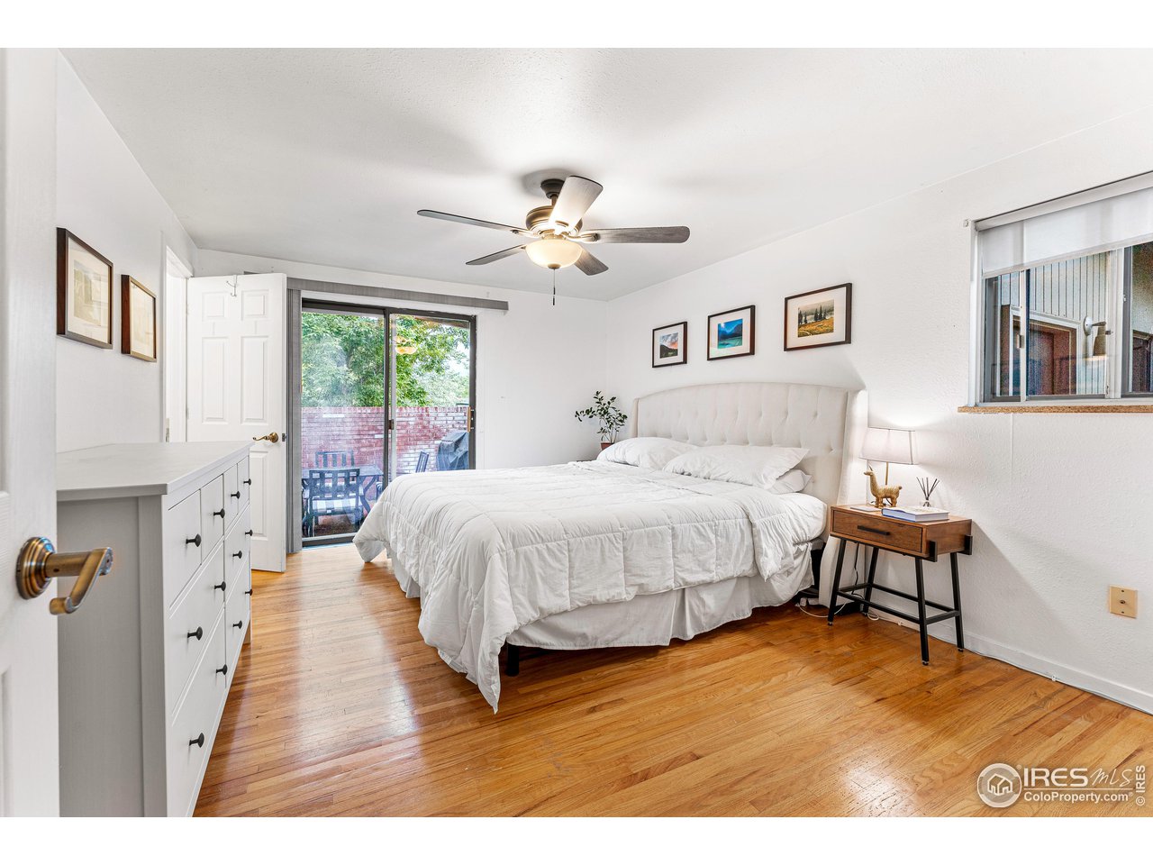 2695 Vassar Drive Boulder, CO 80305 - Photo 18 of 36 main floor primary with sliding doors to patio