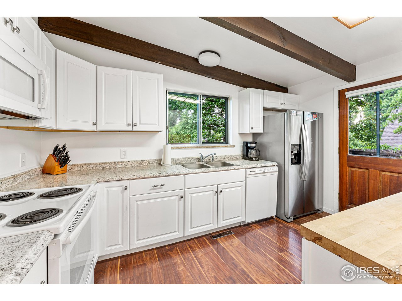 2695 Vassar Drive Boulder, CO 80305 - Photo 3 of 36 light and bright kitchen