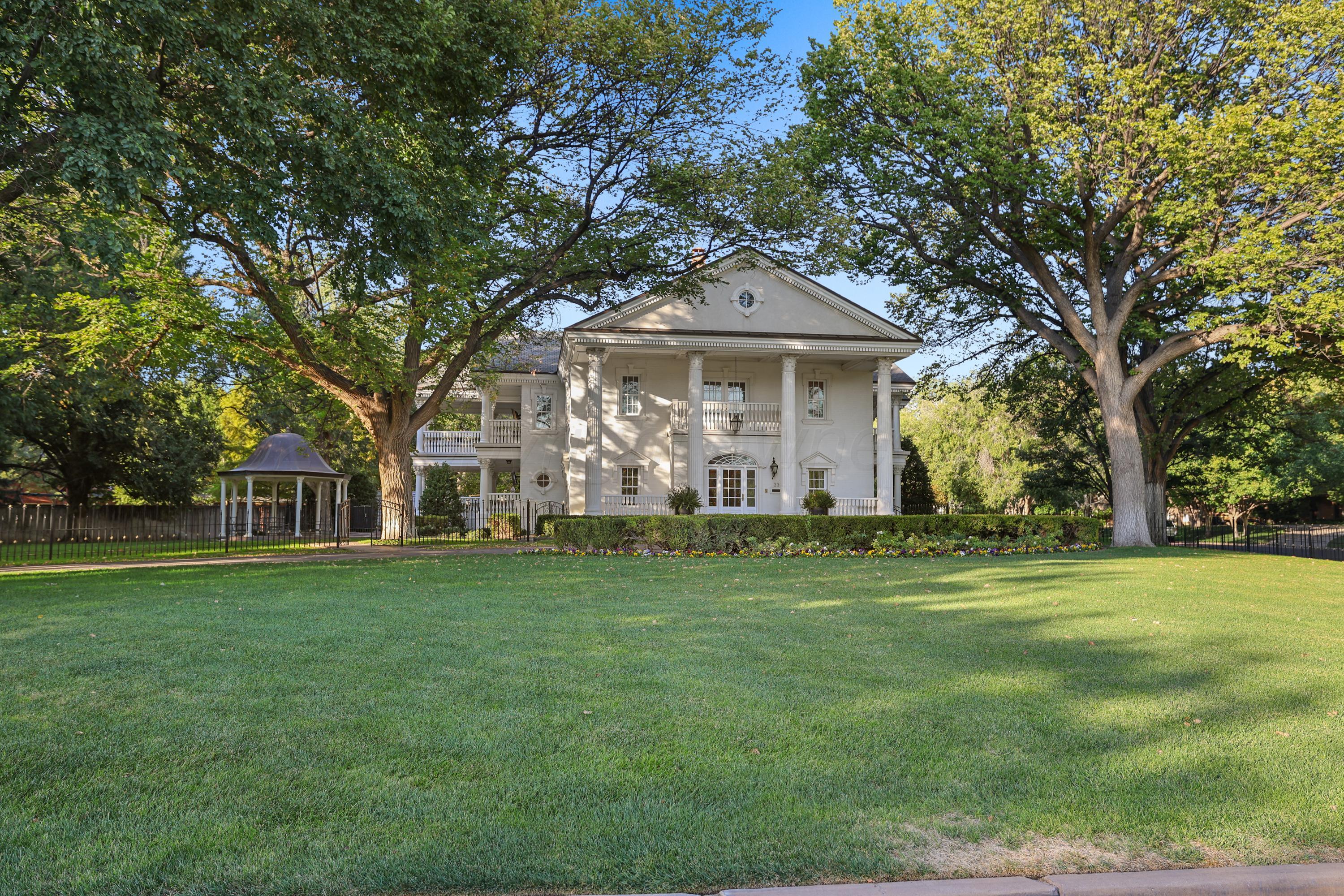 33 Oldham Circle Amarillo, TX 79109 - Photo 22 of 96 a front view of a house with a garden