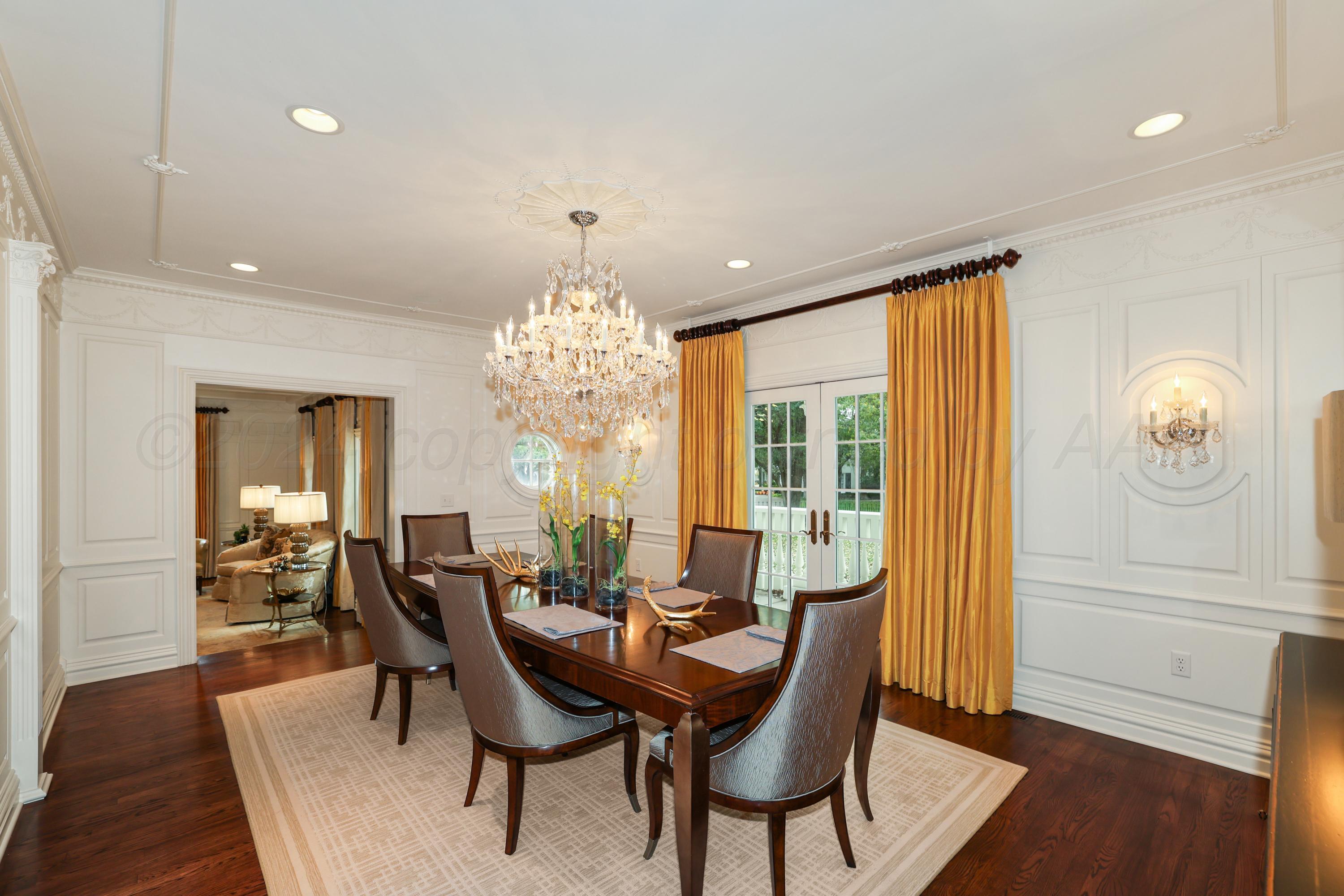 33 Oldham Circle Amarillo, TX 79109 - Photo 34 of 96 a view of a dining room with furniture wooden floor and chandelier