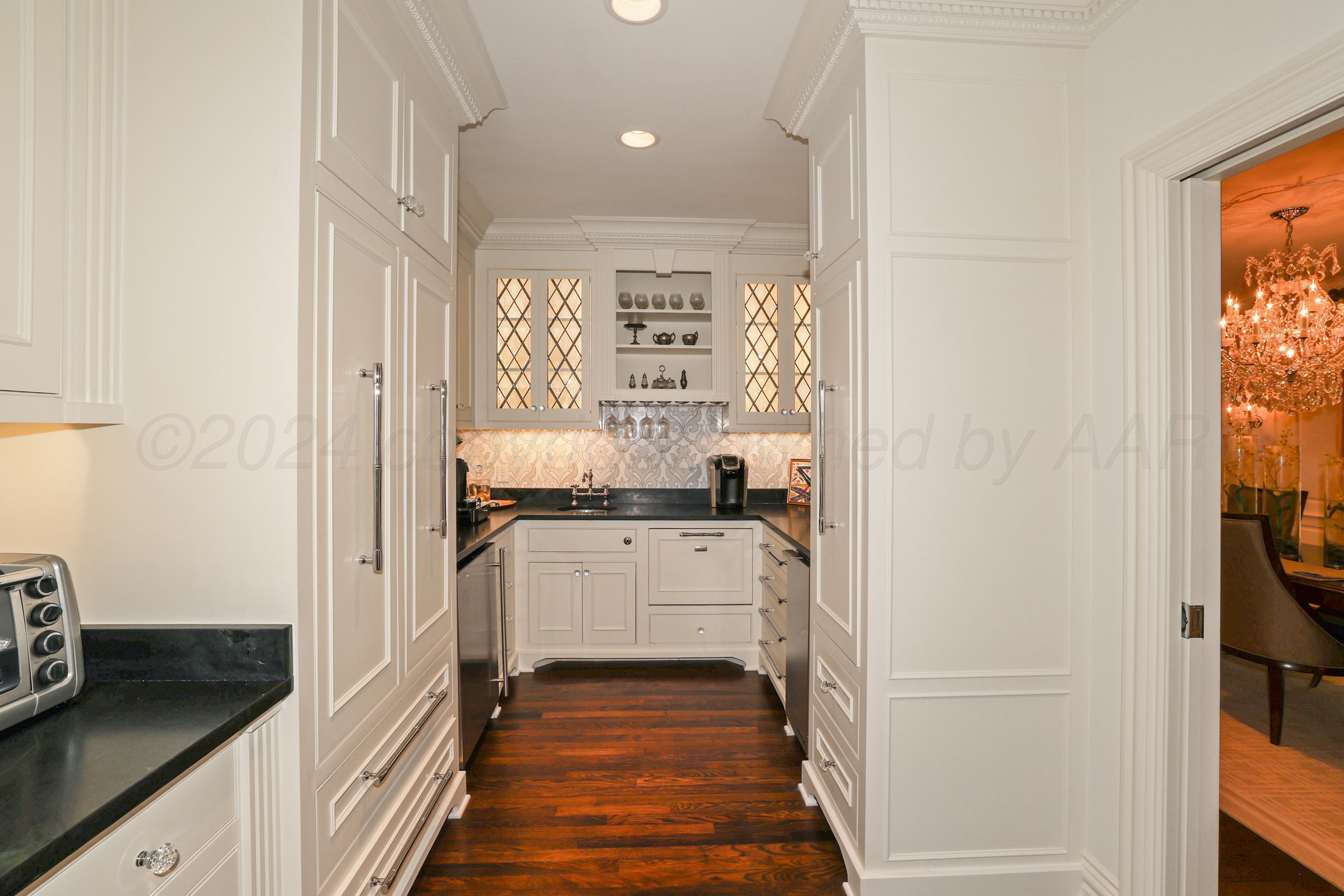 33 Oldham Circle Amarillo, TX 79109 - Photo 38 of 96 a kitchen with a refrigerator and a sink