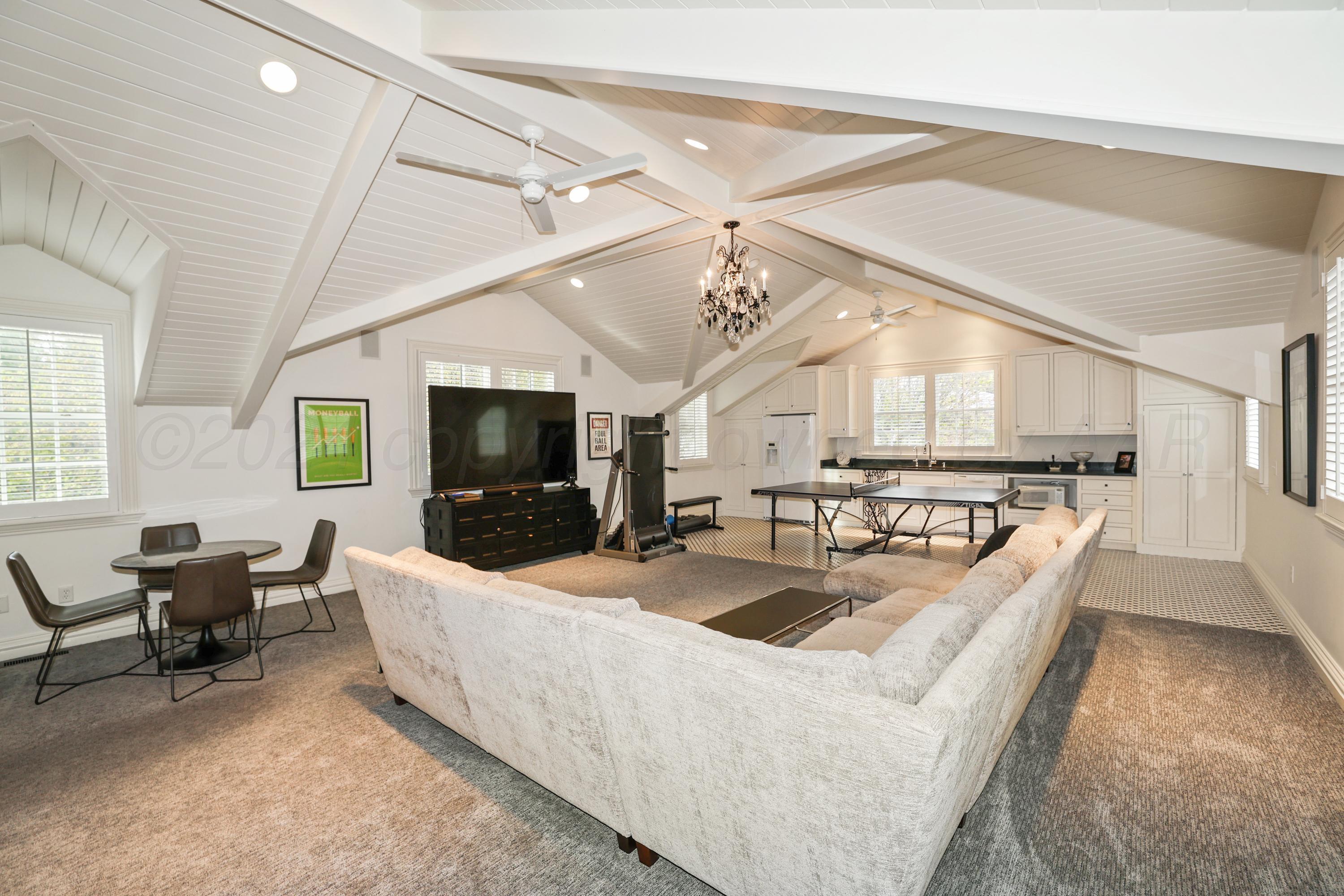33 Oldham Circle Amarillo, TX 79109 - Photo 60 of 96 a living room with furniture and a flat screen tv