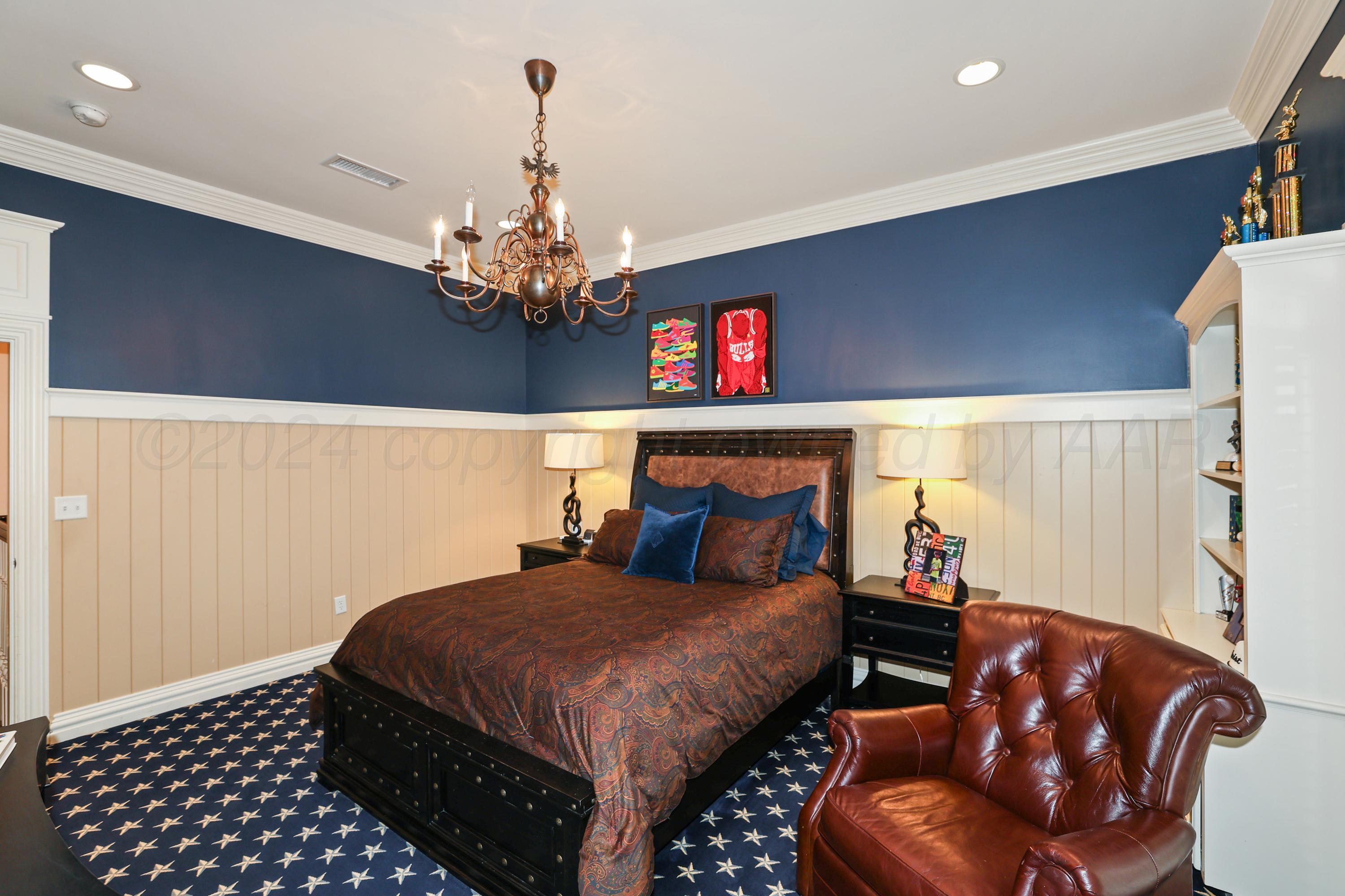 33 Oldham Circle Amarillo, TX 79109 - Photo 86 of 96 a bedroom with bed and wooden floor