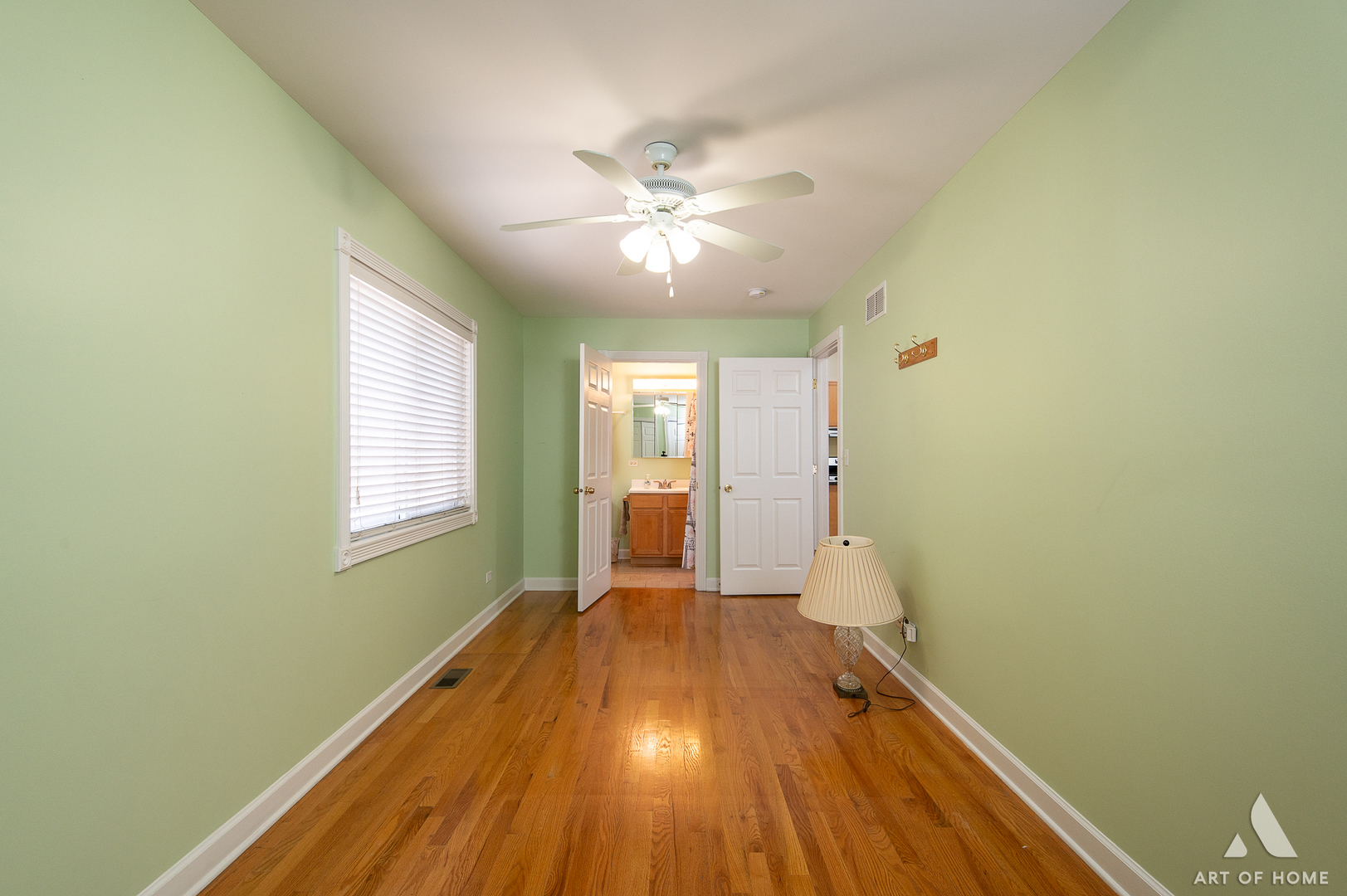 7319 West 58th Place Summit, IL 60501 - Photo 14 of 30 a view of an empty room with window and wooden floor