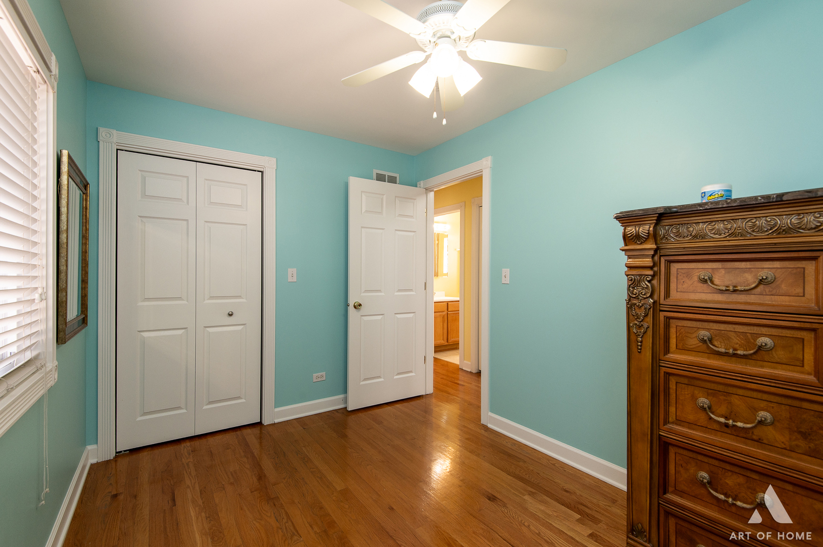 7319 West 58th Place Summit, IL 60501 - Photo 17 of 30 an empty room with wooden floor closet and windows