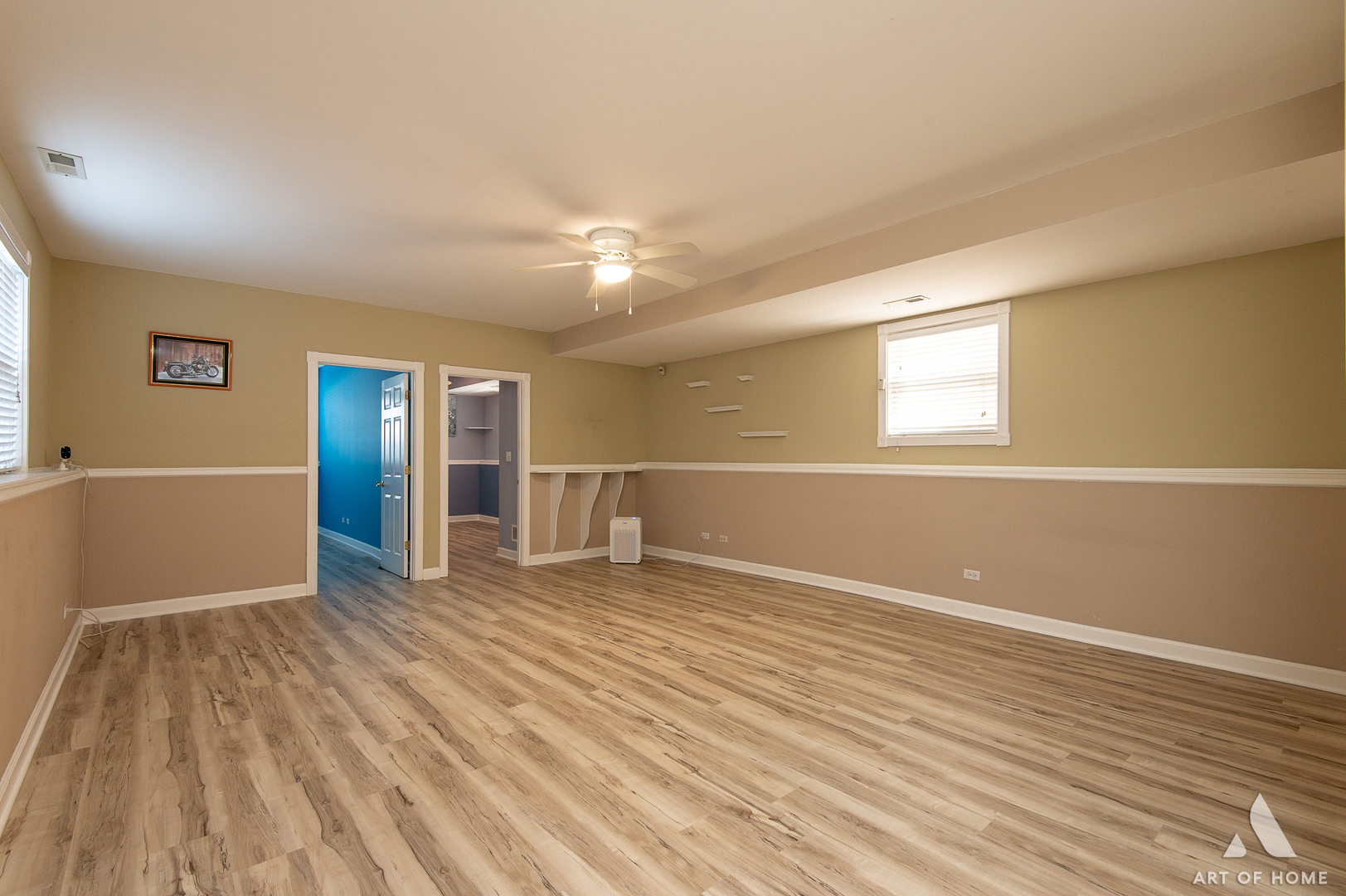 7319 West 58th Place Summit, IL 60501 - Photo 18 of 30 wooden floor in an empty room with a window