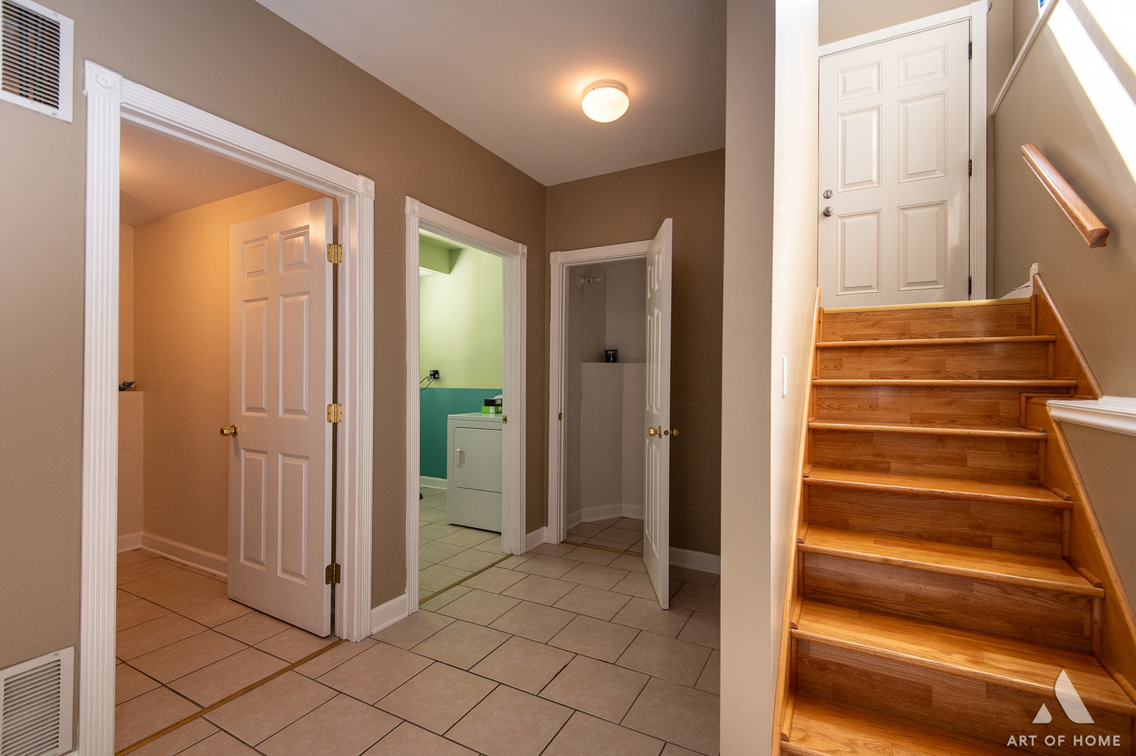 7319 West 58th Place Summit, IL 60501 - Photo 21 of 30 a view of an entryway with wooden floor and door