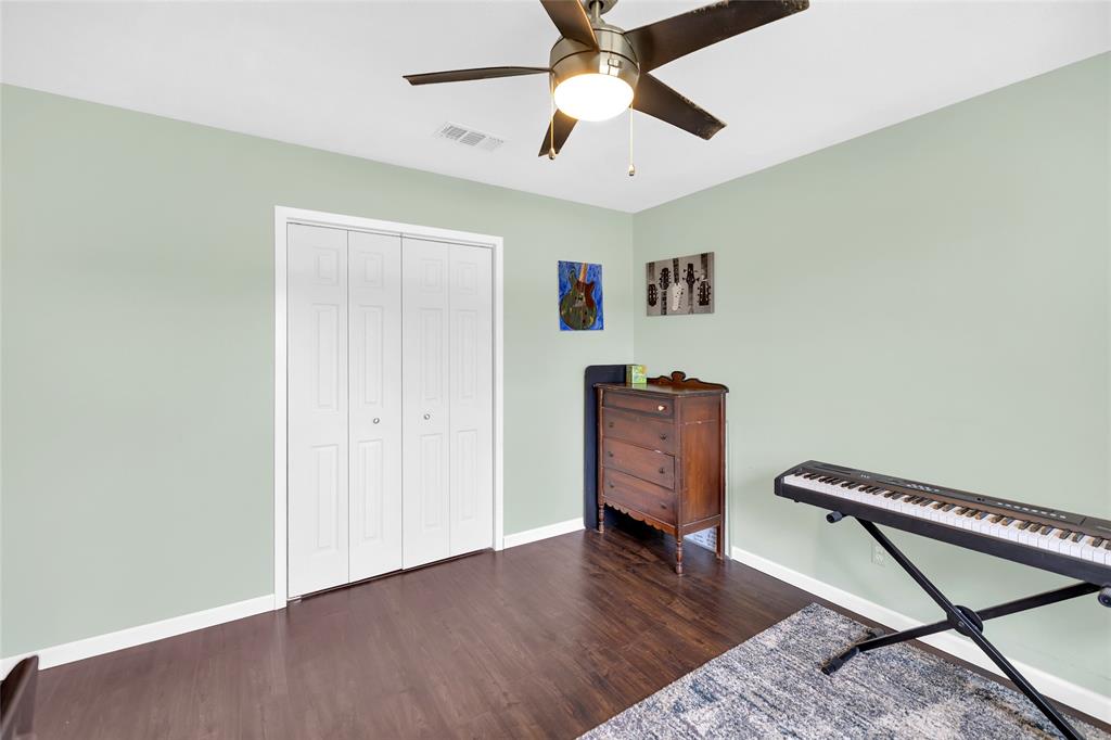 1900 Farm To Market 590, Unit A Zephyr, TX 76890 - Photo 12 of 40 a living room with furniture and a wooden floor
