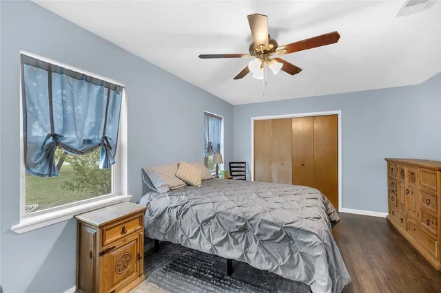 a view of house with outdoor space and swimming pool