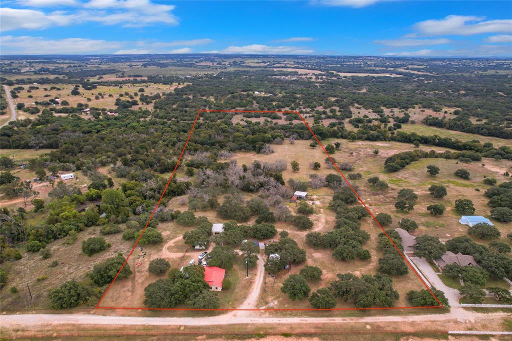 1900 Farm To Market 590, Unit A Zephyr, TX 76890 - Photo 40 of 40 an aerial view of residential houses with outdoor space