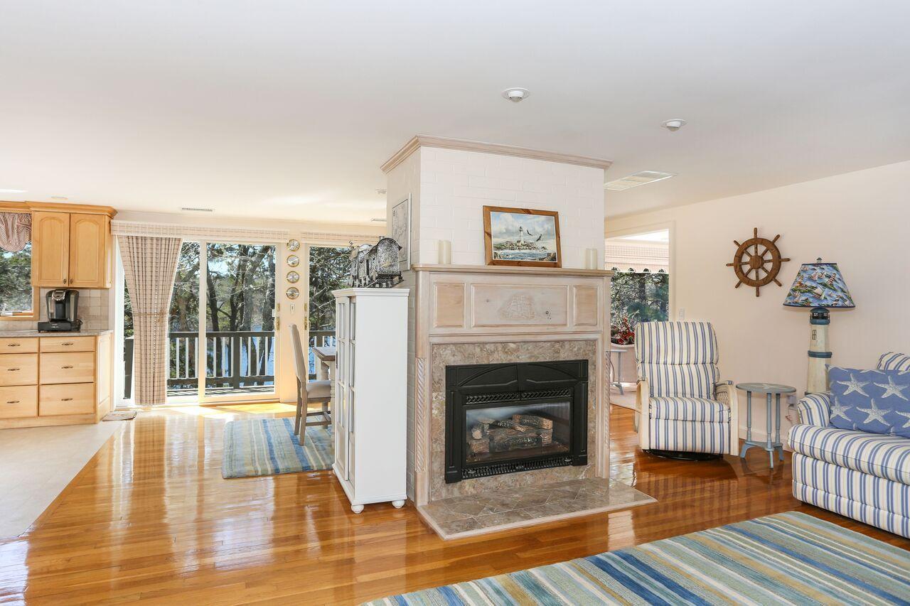 885 Queen Anne Road Harwich, MA 02645 - Photo 1 of 24 885QueLR-5_preview fireplace