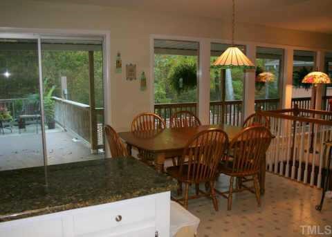 1606 Medfield Road Raleigh, NC 27607 - Photo 5 of 10 a view of a dining room with furniture window and outside view
