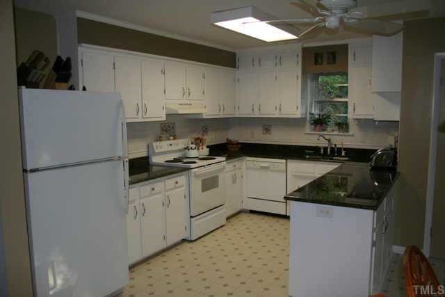 1606 Medfield Road Raleigh, NC 27607 - Photo 6 of 10 a kitchen with a sink and cabinets