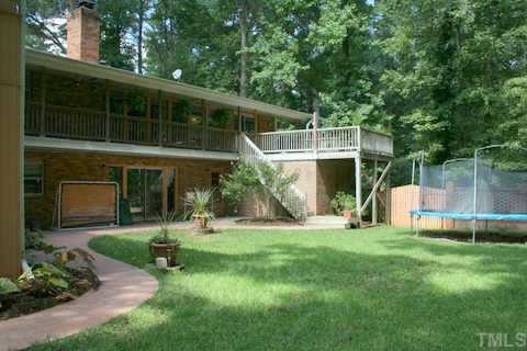 1606 Medfield Road Raleigh, NC 27607 - Photo 7 of 10 a view of a house with backyard and porch