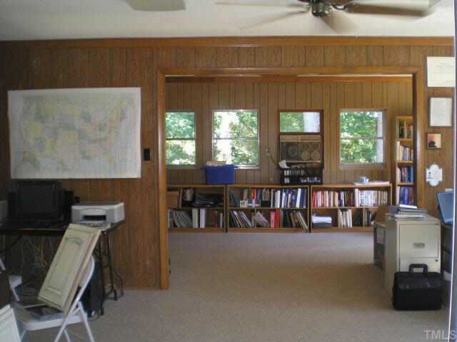 1606 Medfield Road Raleigh, NC 27607 - Photo 9 of 10 a view of a workspace with furniture and a window