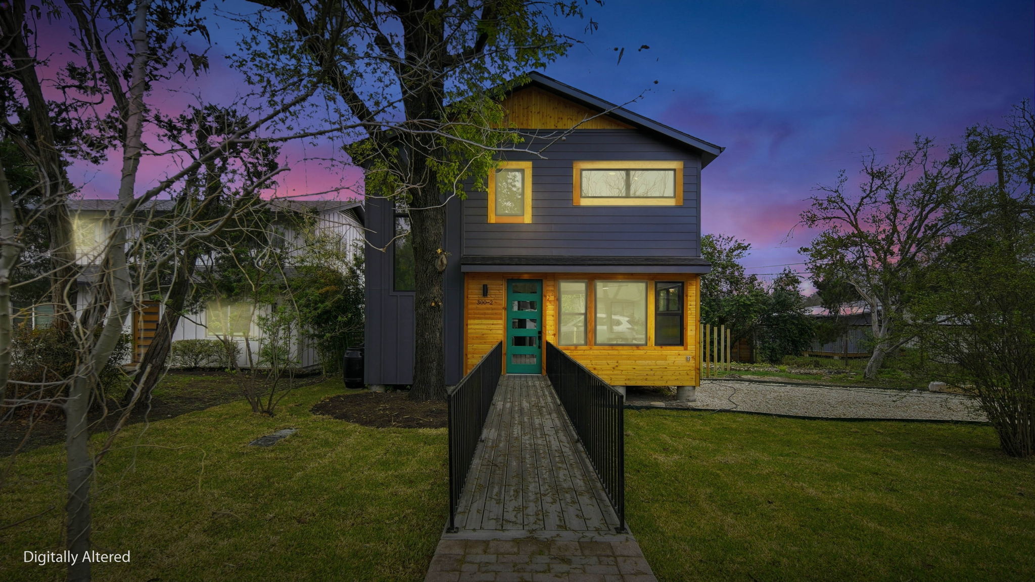 300 Lightsey Road, Unit 2 Austin, TX 78704 - Photo 1 of 30 a front view of a house with a yard