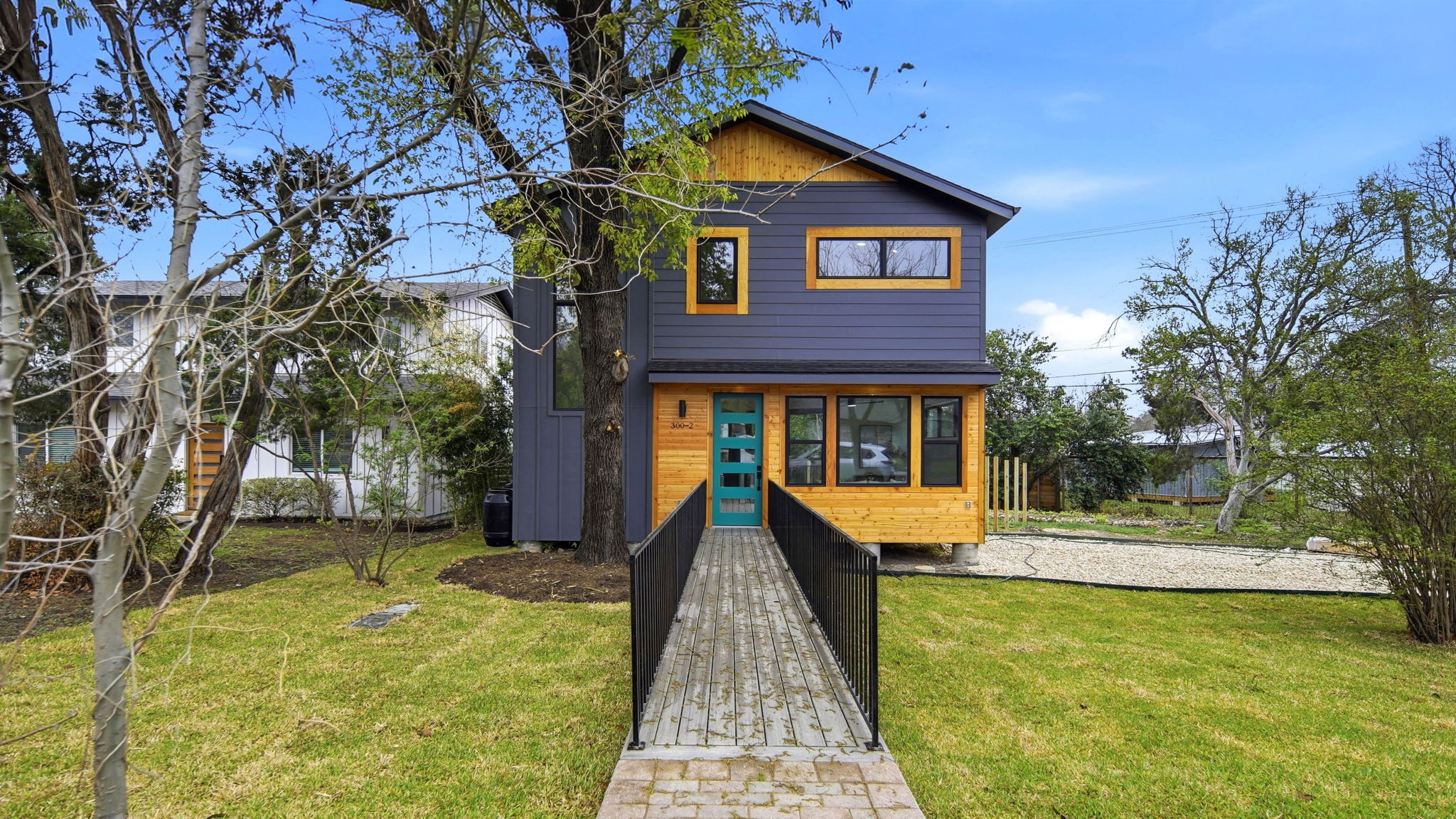 300 Lightsey Road, Unit 2 Austin, TX 78704 - Photo 2 of 30 a front view of a house with a yard