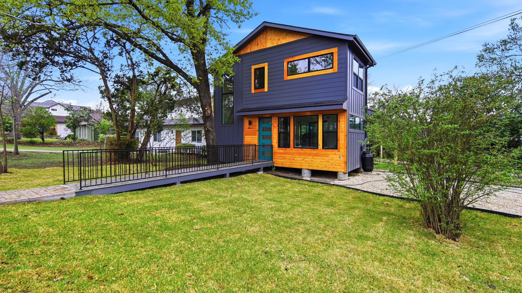 300 Lightsey Road, Unit 2 Austin, TX 78704 - Photo 4 of 30 a view of a house with a yard and a large tree