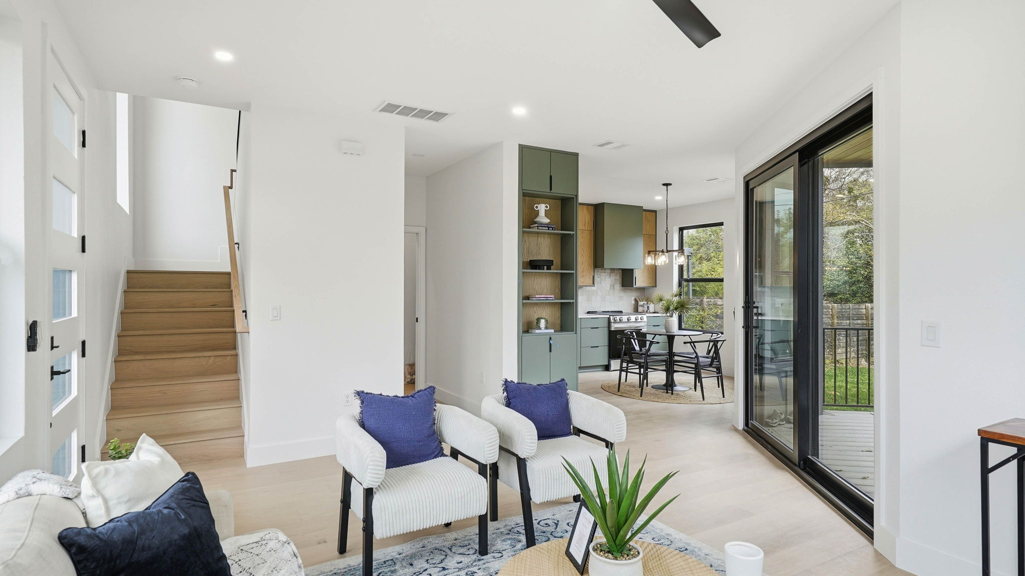 300 Lightsey Road, Unit 2 Austin, TX 78704 - Photo 9 of 30 a living room with furniture and a floor to ceiling window