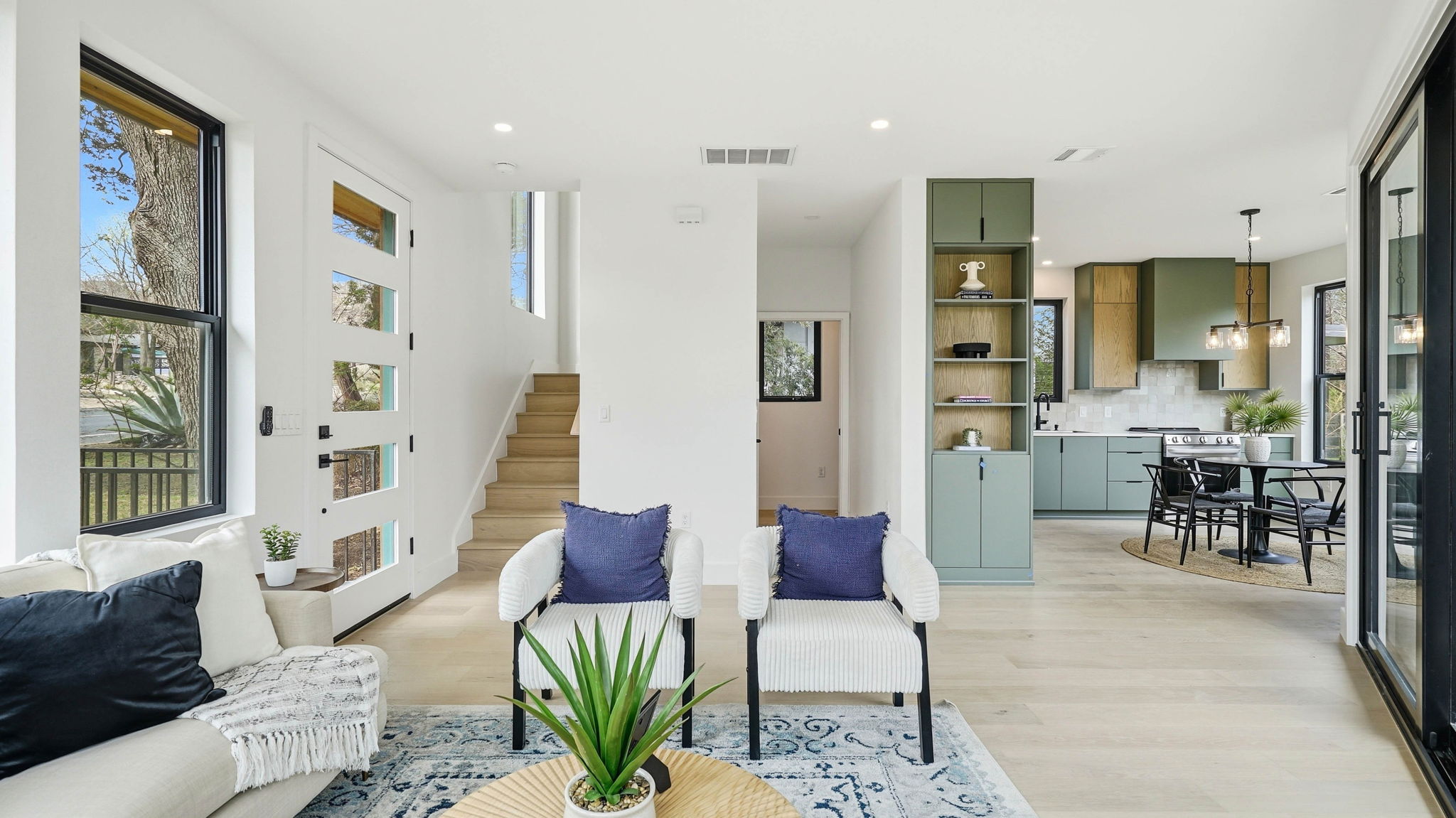 300 Lightsey Road, Unit 2 Austin, TX 78704 - Photo 10 of 30 a living room with furniture and a large window